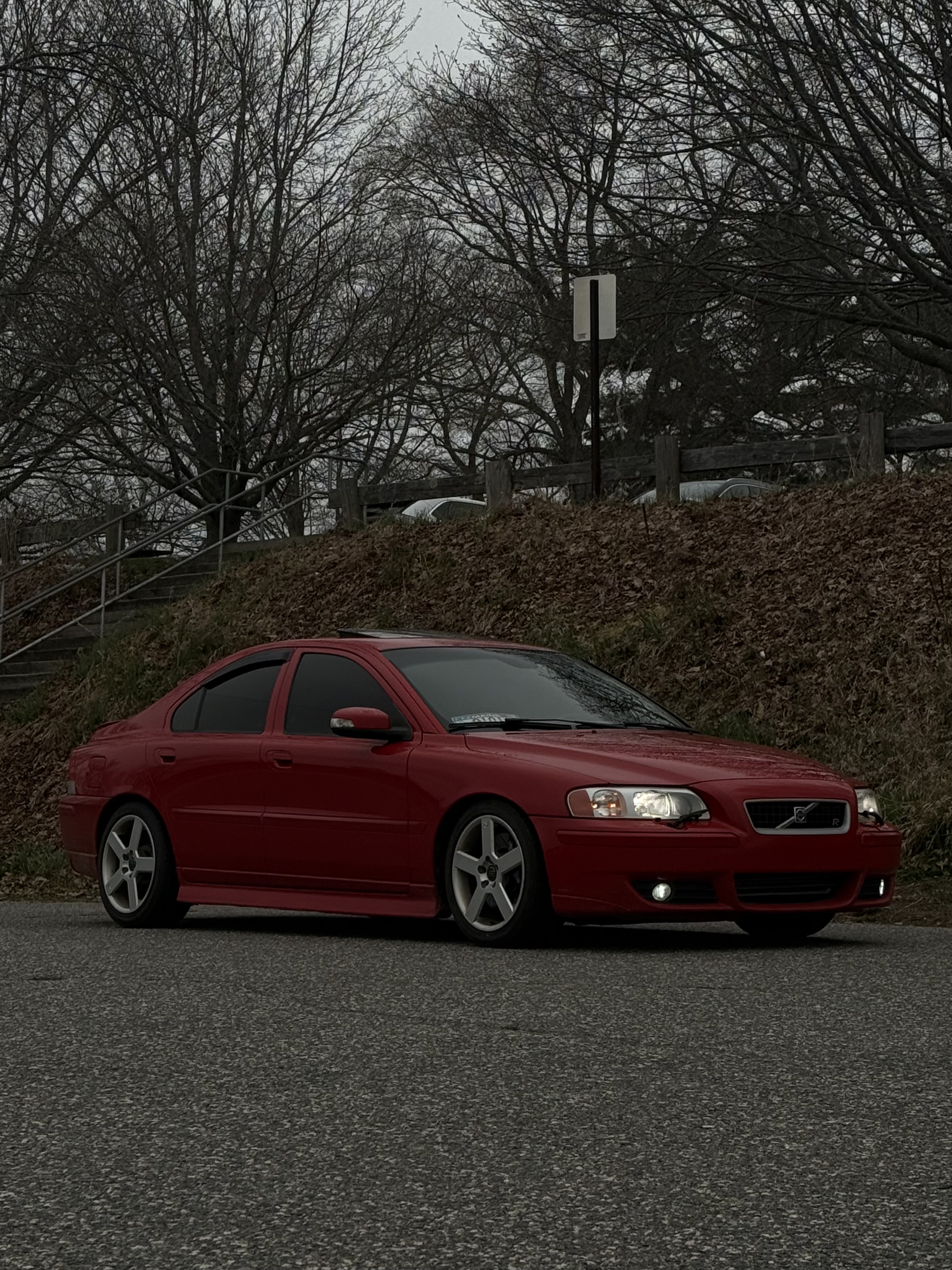 Derrick's red 2007 Volvo S60R parked on a gray day